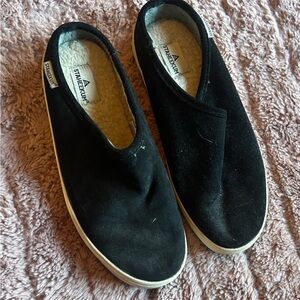 Black Slip-On Shoes by Staheekum